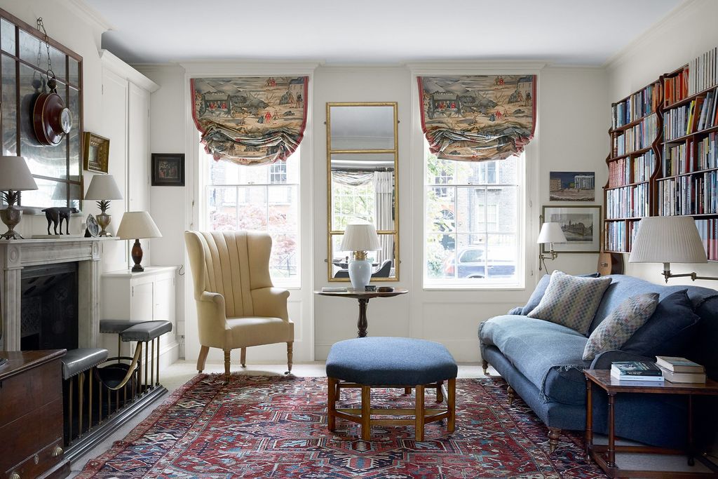 Image may contain Furniture Home Decor Living Room Indoors Room and Rug