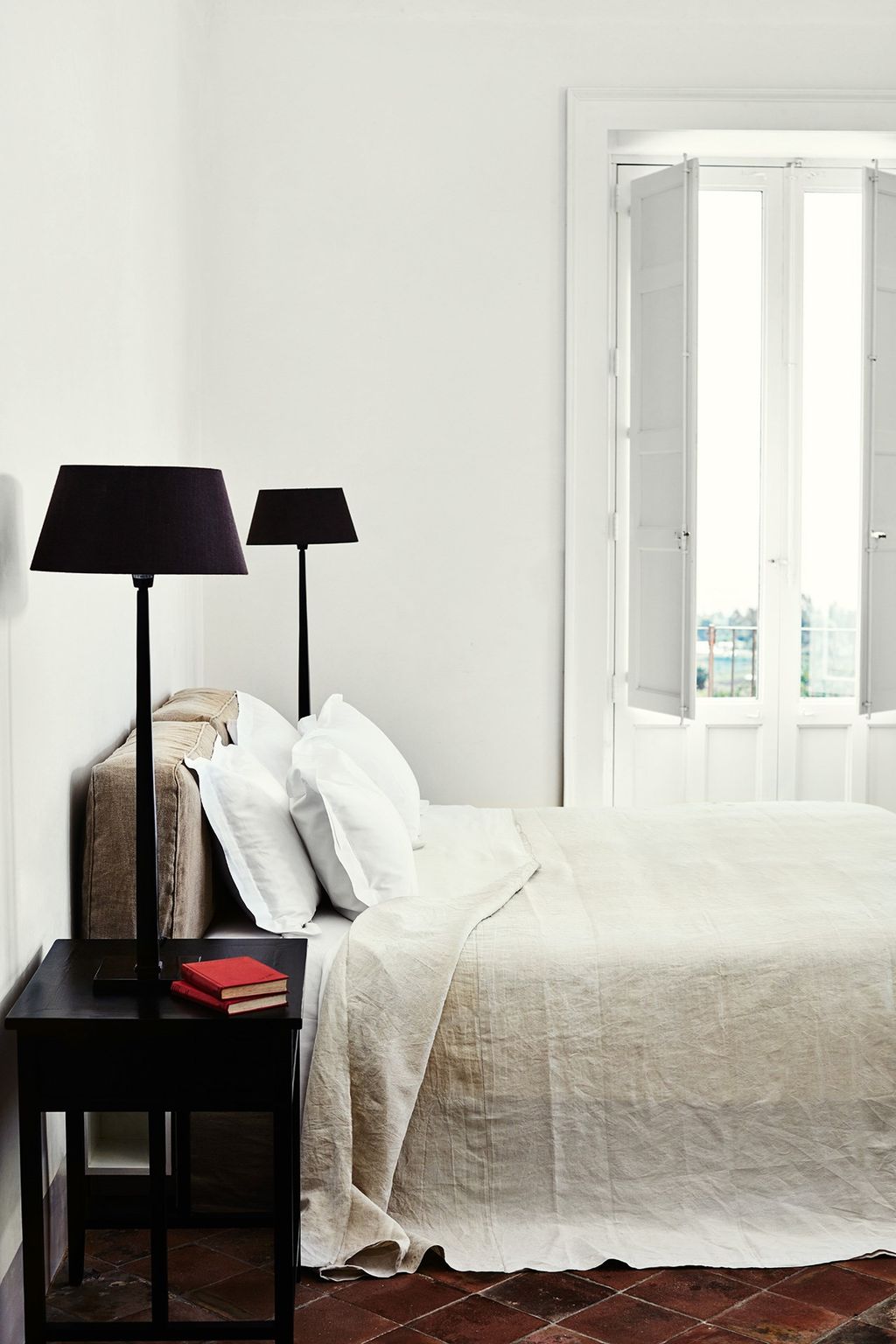 All of the home's bedrooms feature original terracottatiled floors.