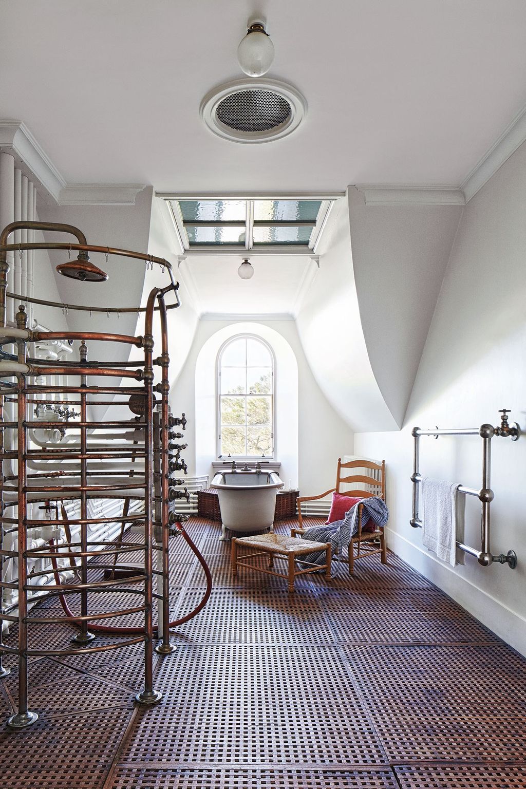 Image may contain Housing Building Indoors Interior Design Furniture Cushion Pillow Room Living Room and Banister