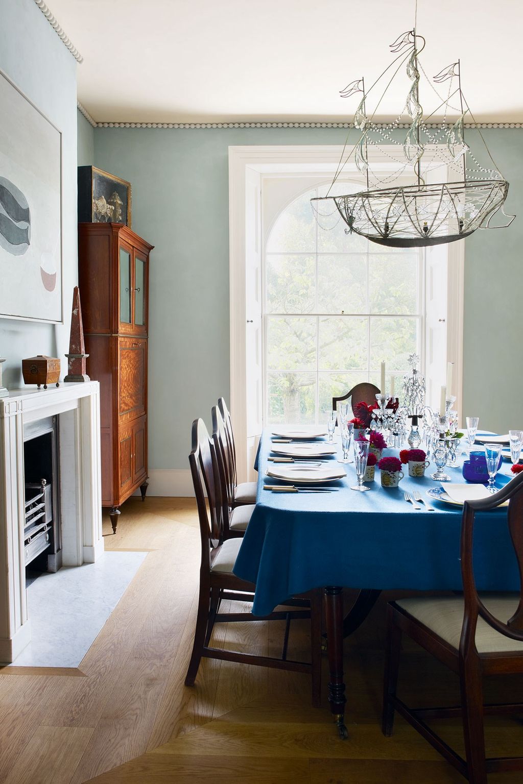 Image may contain Furniture Chair Indoors Room Dining Room Table and Dining Table