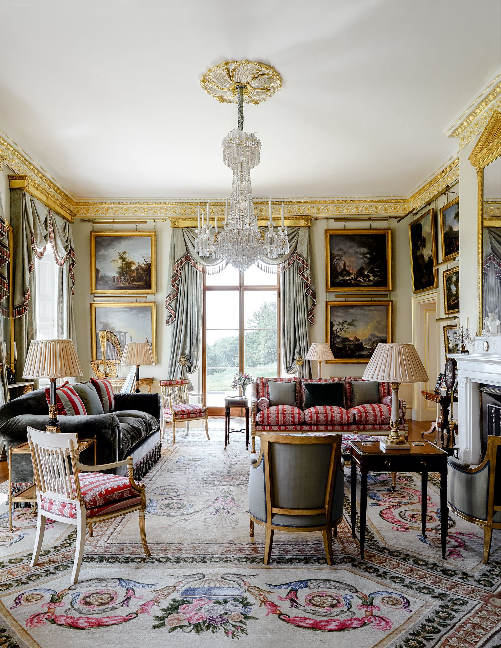 Image may contain Living Room Room Indoors Furniture Interior Design Couch Rug Chair Waiting Room and Reception