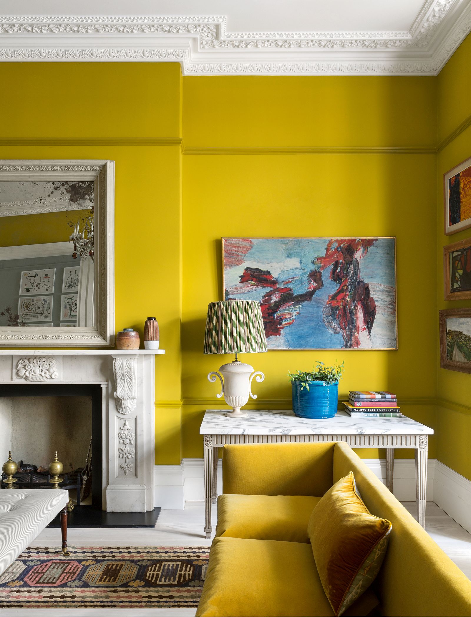 Image may contain Living Room Room Indoors Furniture Interior Design Fireplace Hearth and Couch