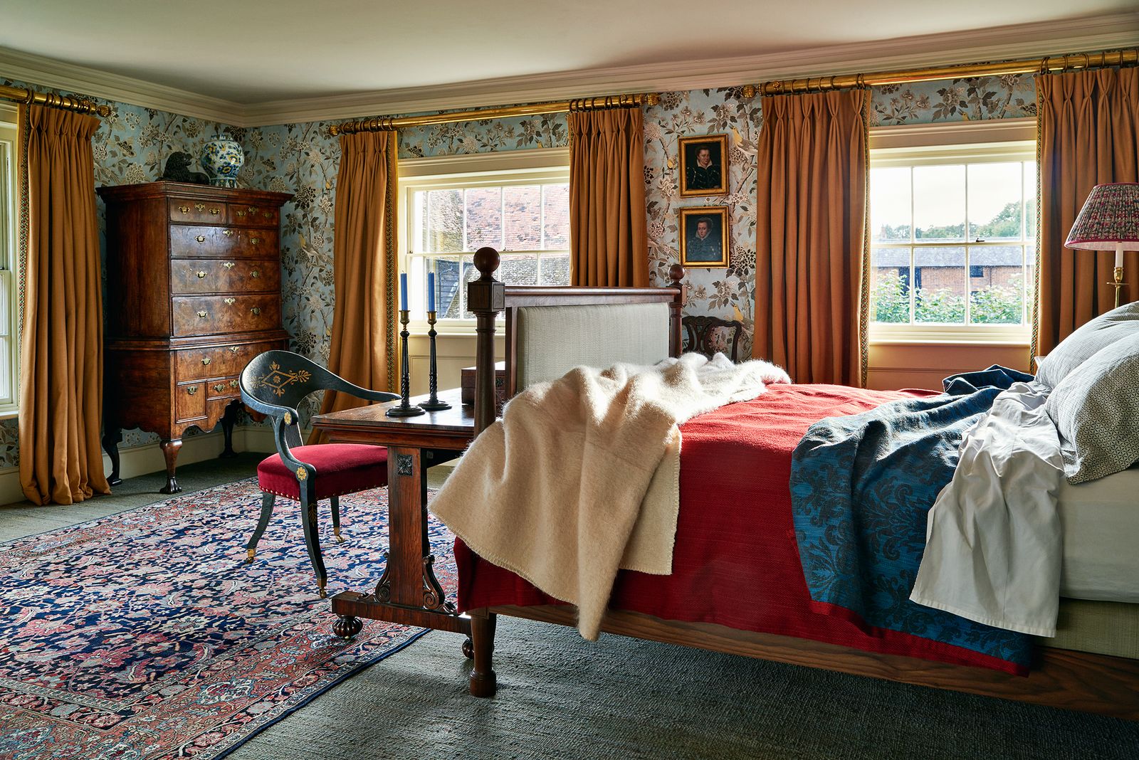 Image may contain Room Indoors Wood Flooring Furniture Living Room Bedroom Couch Hardwood Floor and Chair