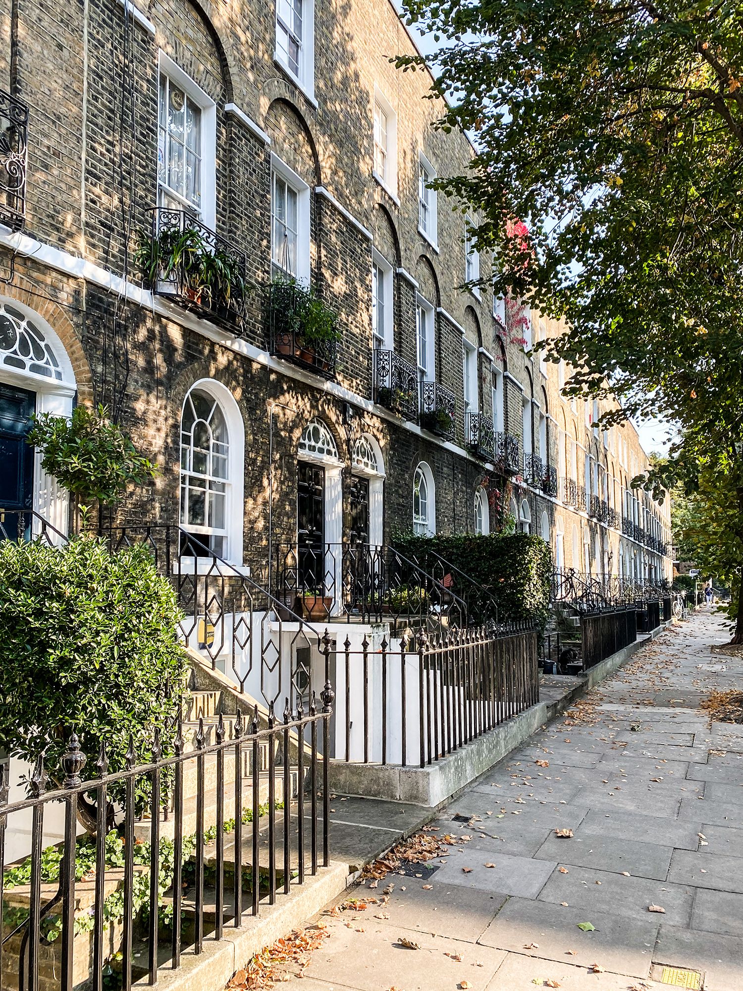 Image may contain Railing Banister Handrail Path Flagstone Walkway Sidewalk and Pavement