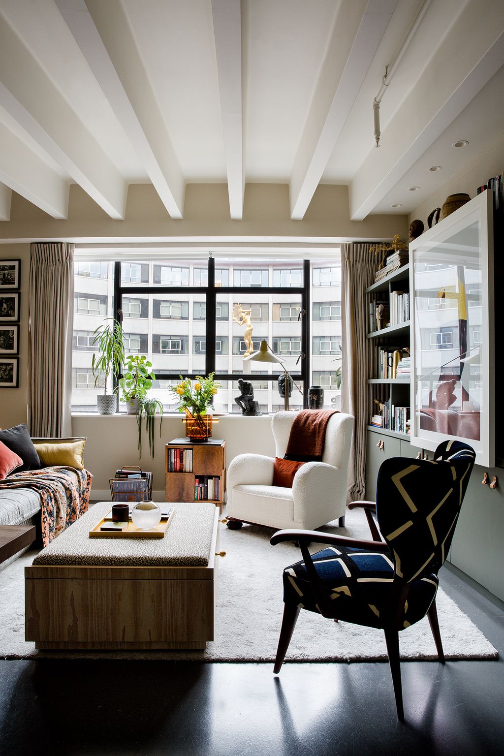 Image may contain Furniture Chair Living Room Room Indoors Table and Couch