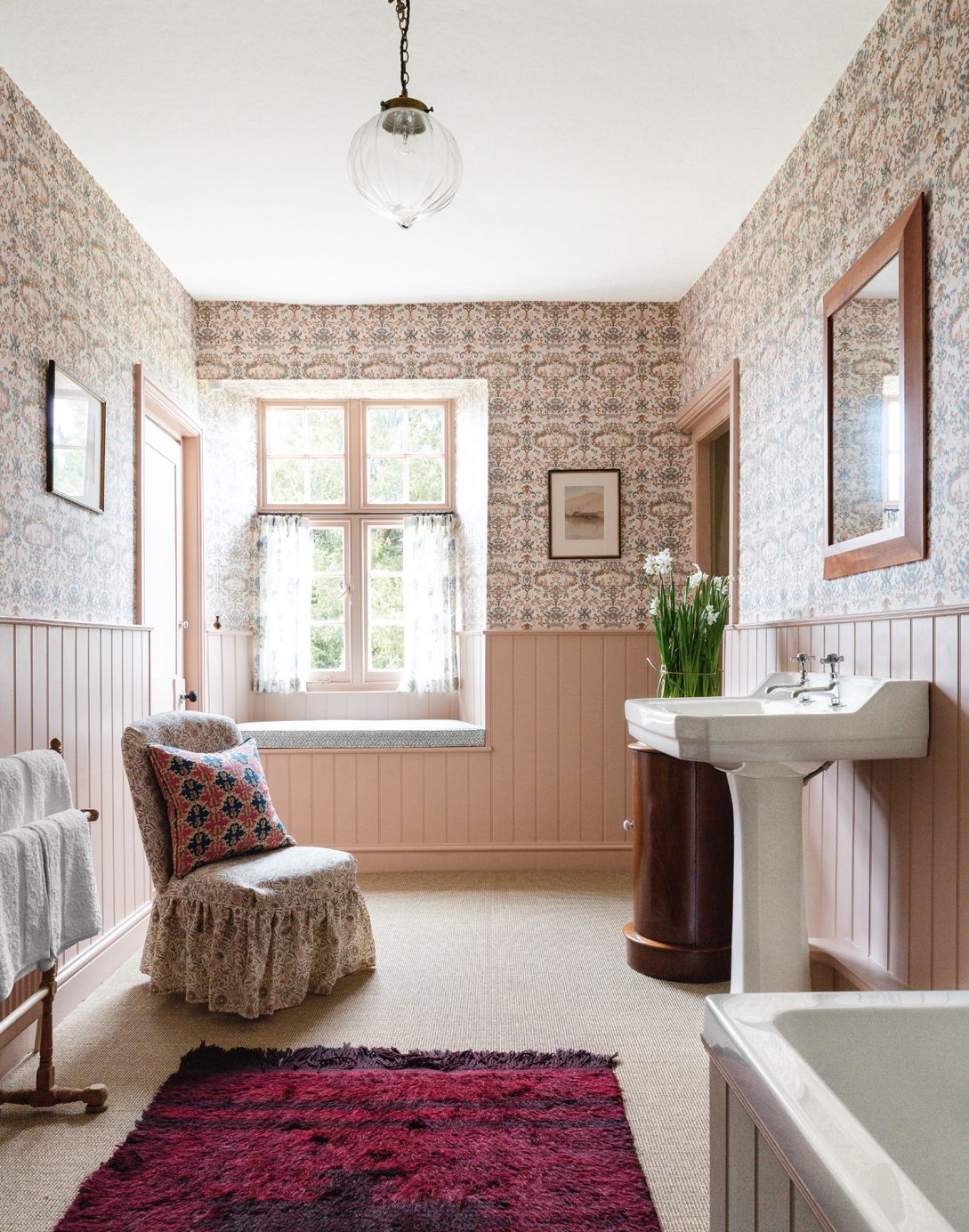 A Norfolk manor house designed by Carlos Garcia features walltowall carpeting in the bathroom topped further with a...