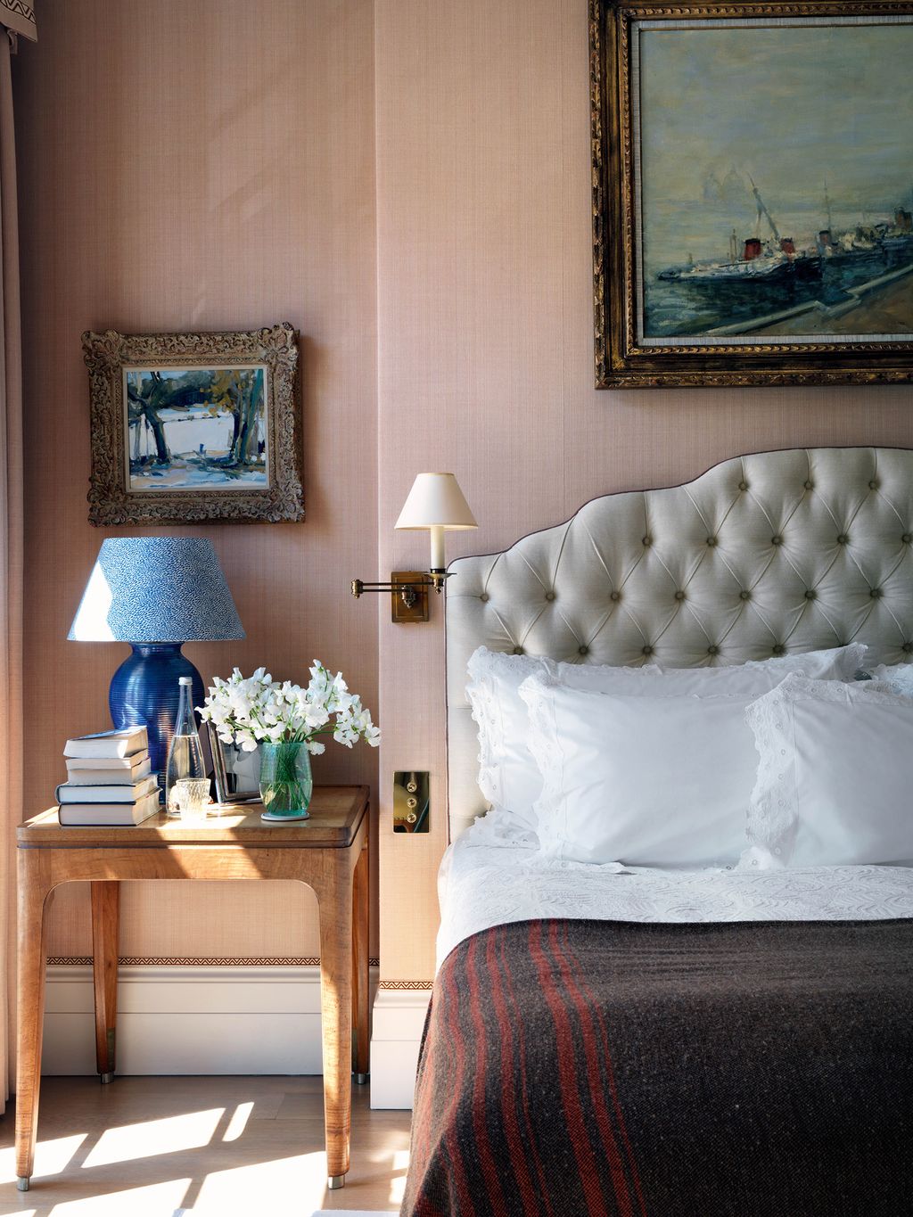 Image may contain Indoors Room Bedroom Lamp Table Lamp Furniture and Living Room