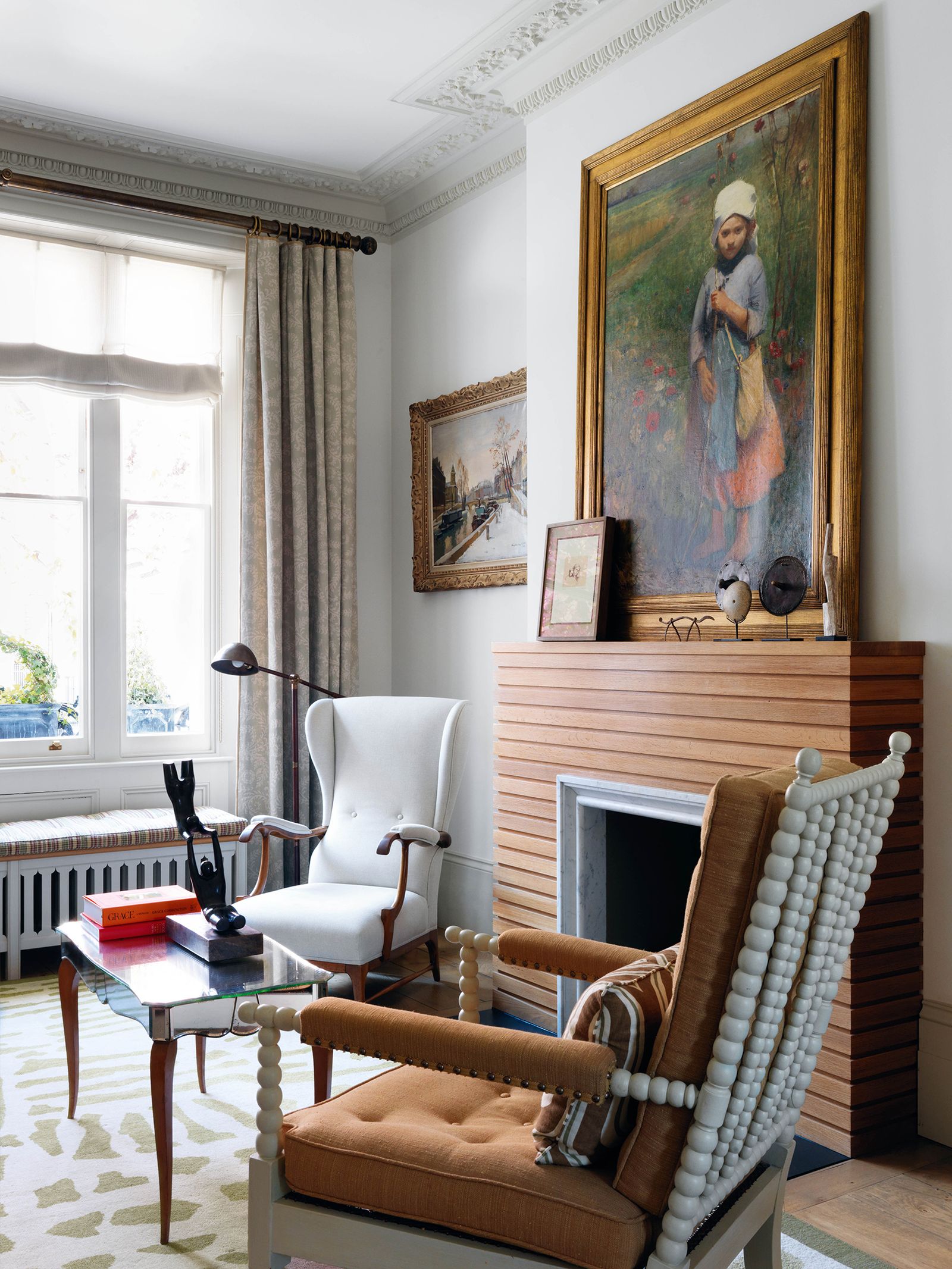 Image may contain Living Room Room Indoors Furniture Chair Human Person Couch Table Home Decor and Interior Design