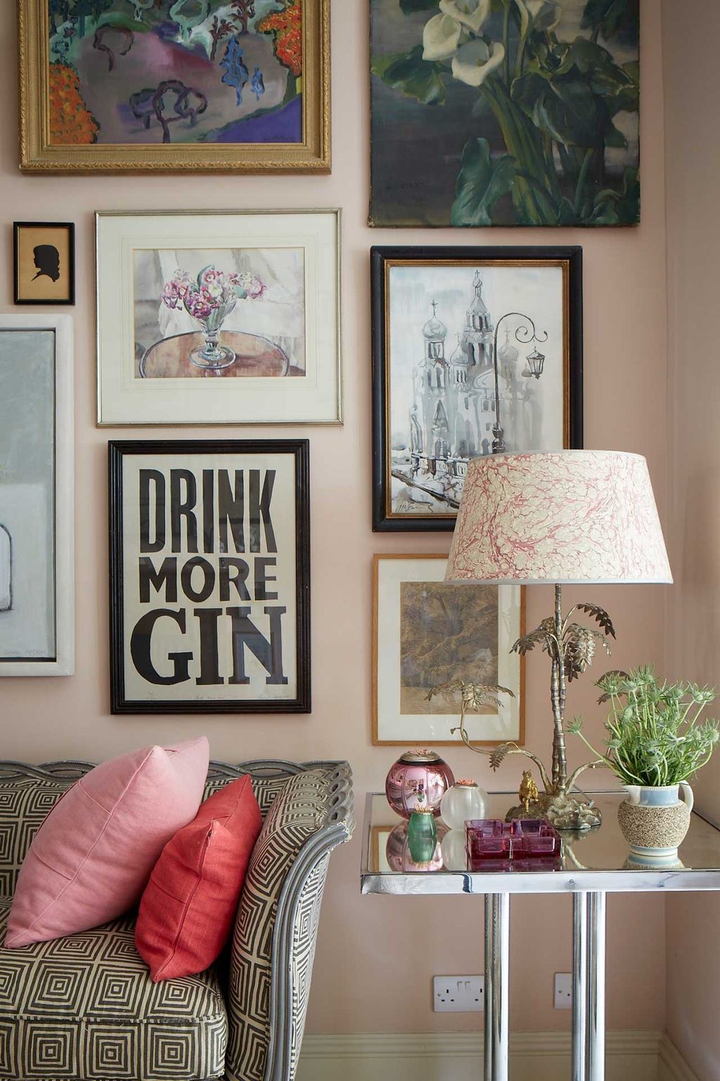 How to hang framed pictures at home. Image may contain Furniture Couch Living Room Indoors Room Lamp Table Lamp Table...