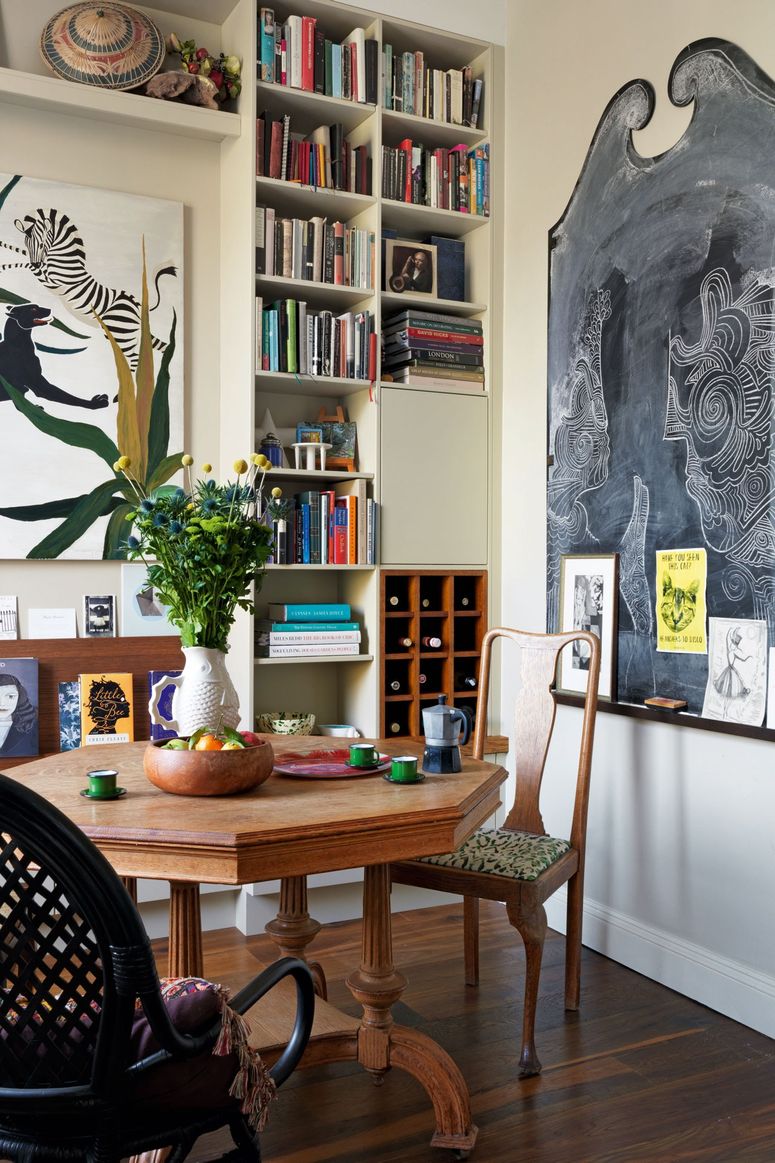 Image may contain: Furniture, Chair, Wood, Interior Design, Indoors, Canvas, Bookcase, Shelf, Room, and Table