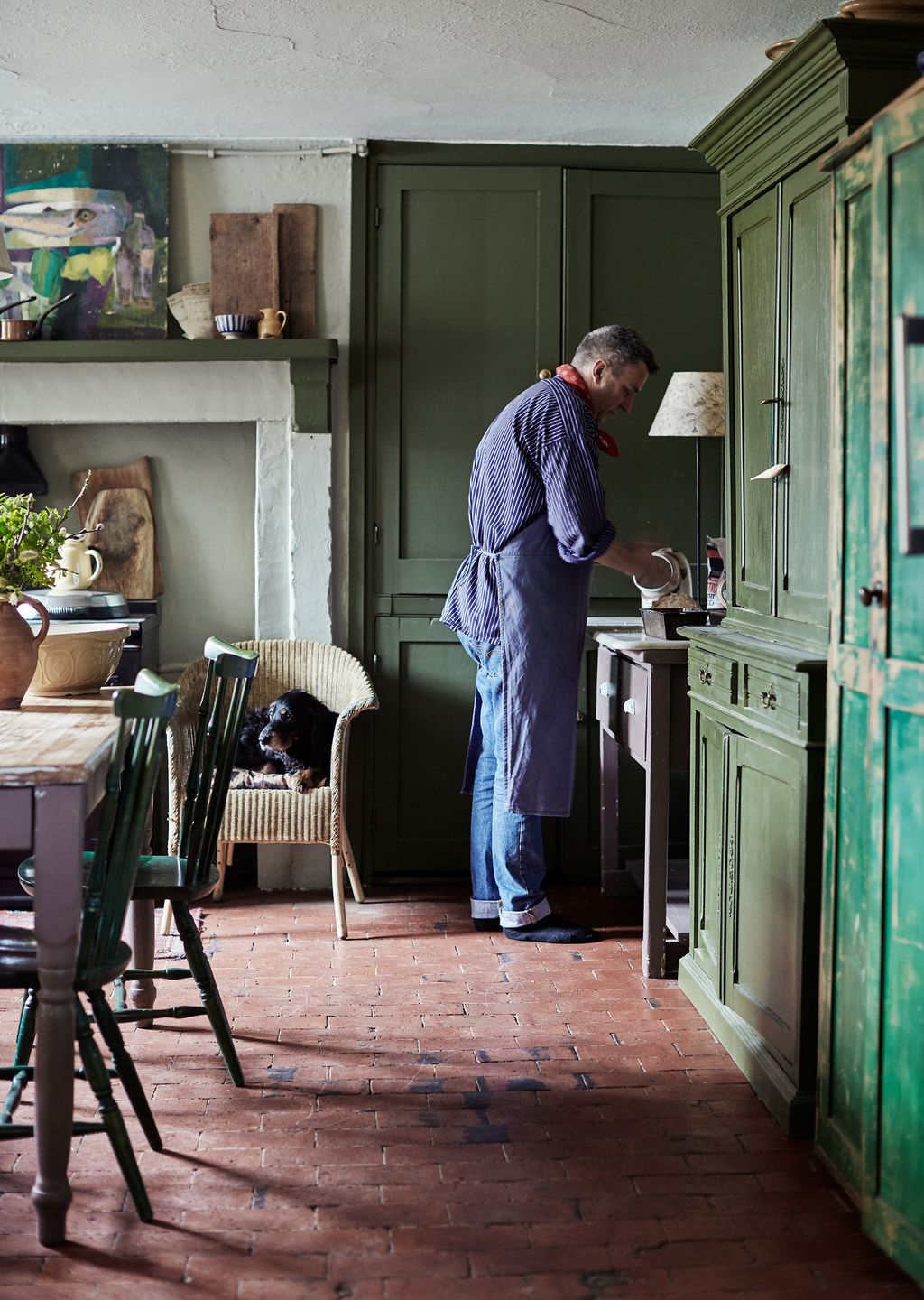 Image may contain Wood Human Person Flooring Furniture Hardwood Plywood Floor Chair Footwear Clothing and Shoe