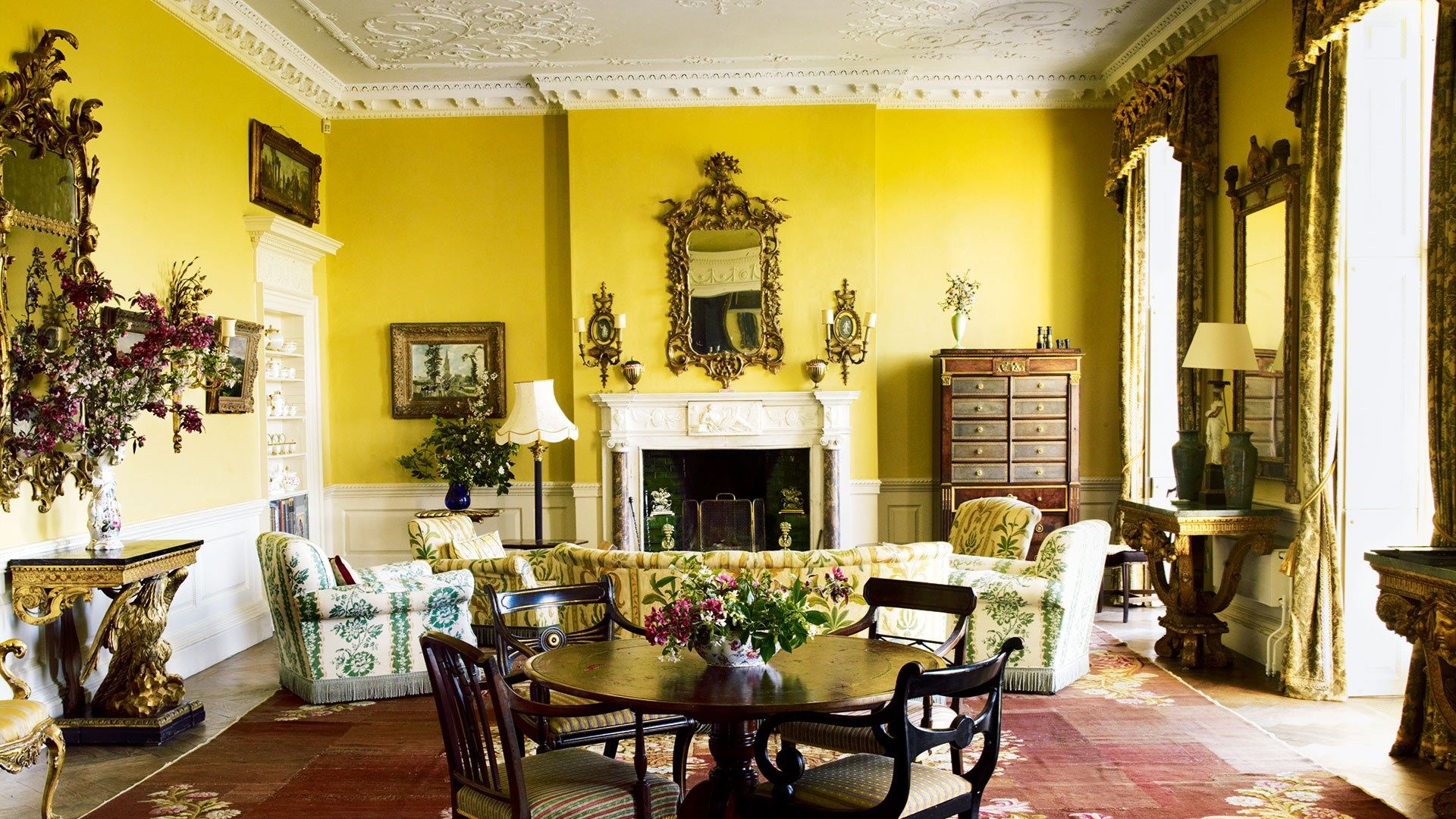 Image may contain Furniture Chair Living Room Room Indoors Interior Design Home Decor and Plant