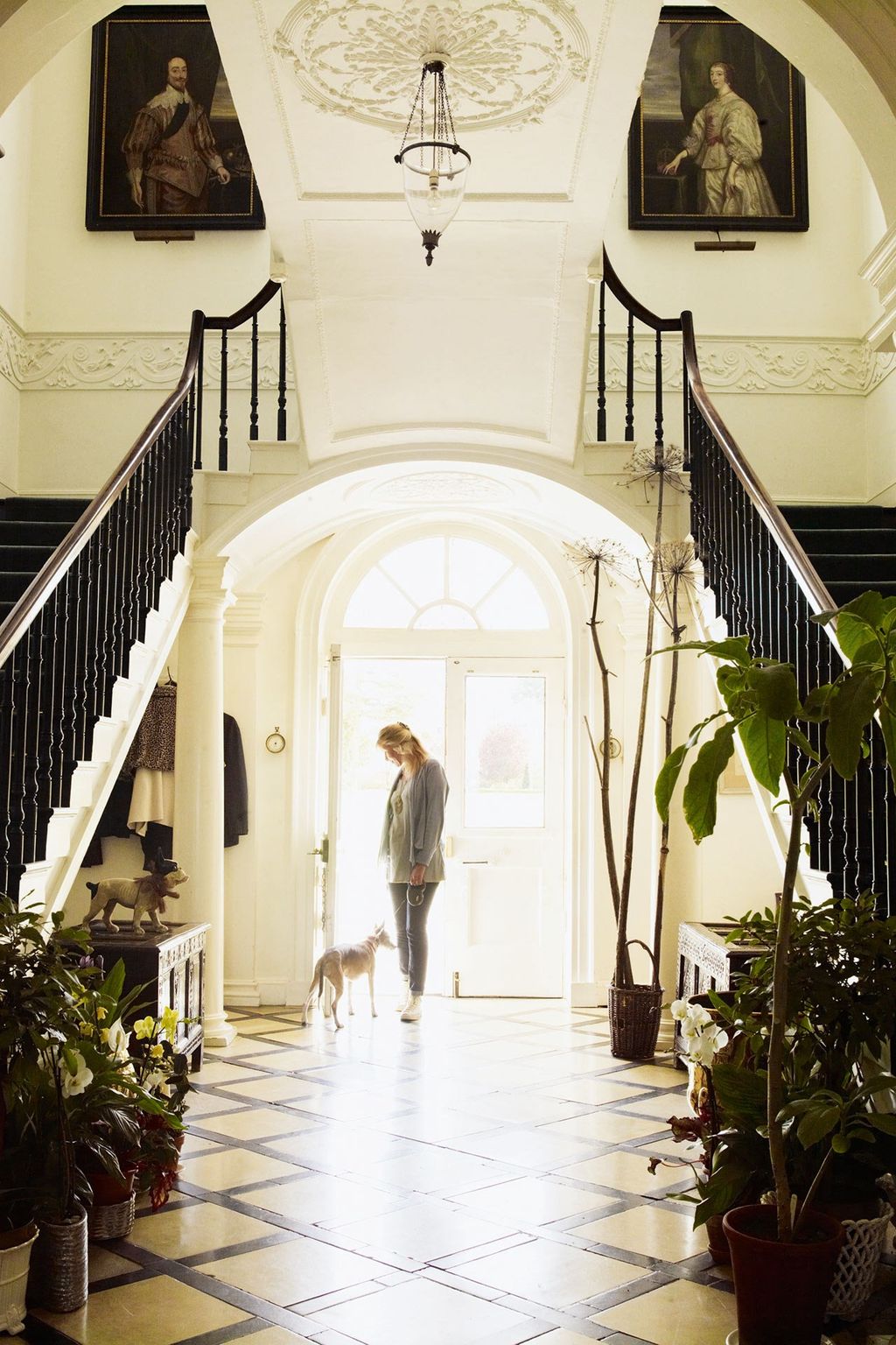 Image may contain Banister Handrail Human Person Indoors Interior Design Flooring Clothing Shoe and Footwear