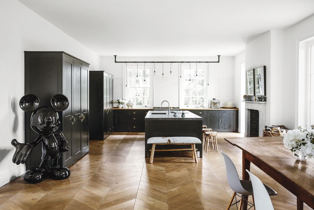 Image may contain Flooring Wood Floor Hardwood Furniture Chair Interior Design and Indoors