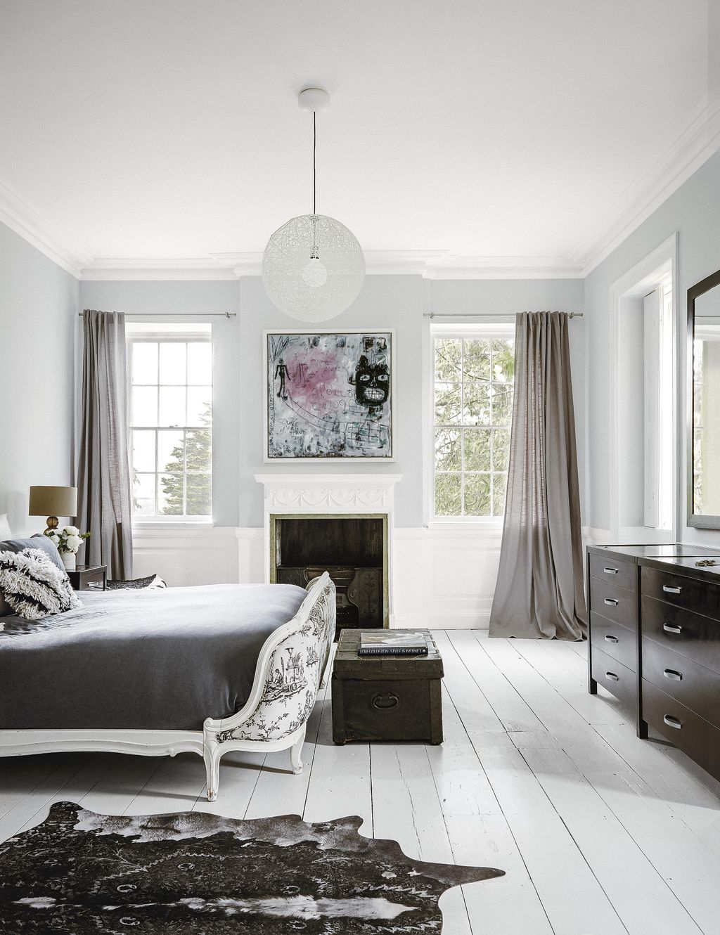 Image may contain Interior Design Indoors Furniture Room Bedroom Rug Sideboard Living Room and Bed