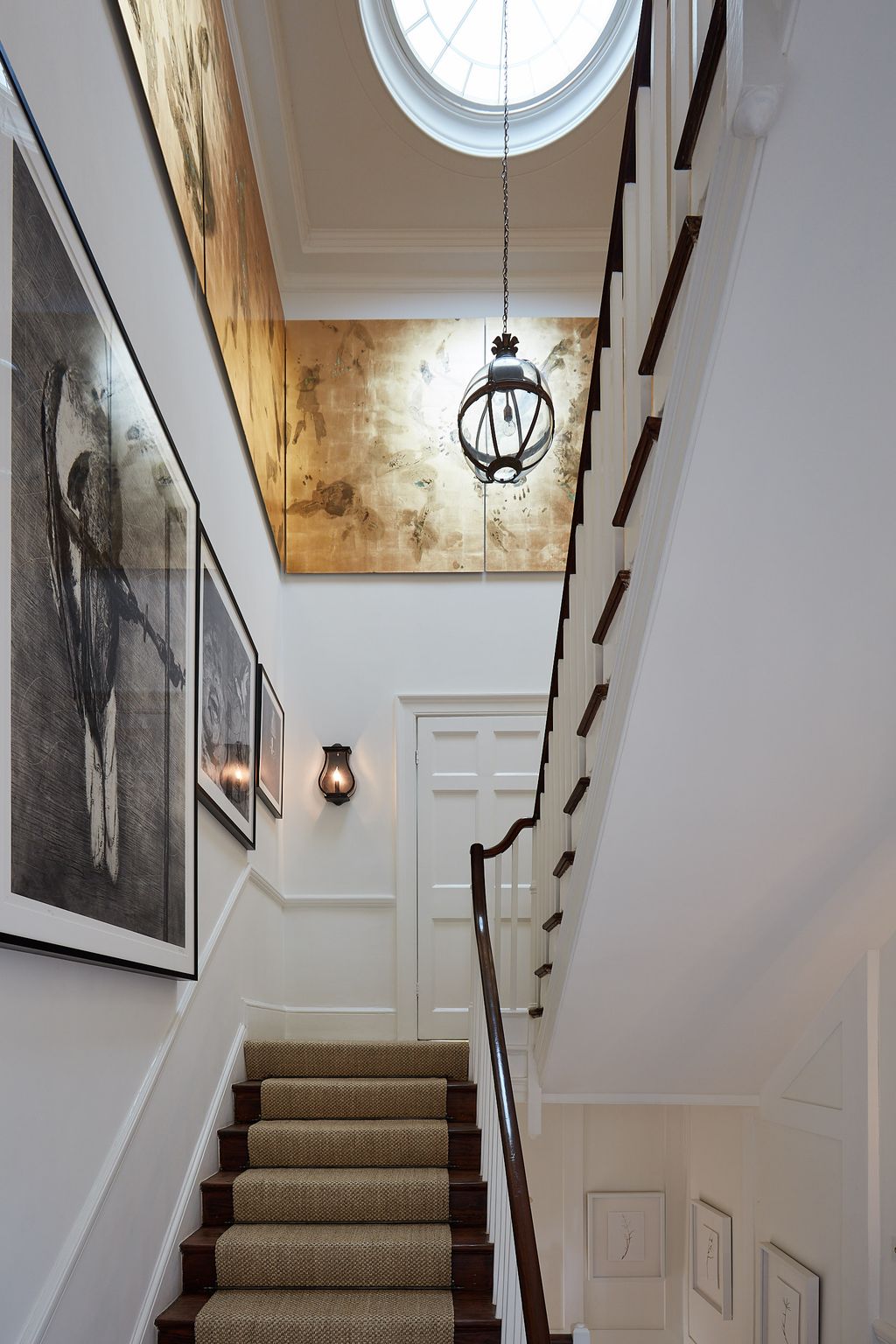 Image may contain Banister Handrail Interior Design Indoors Clock Tower Architecture Tower Building and Staircase