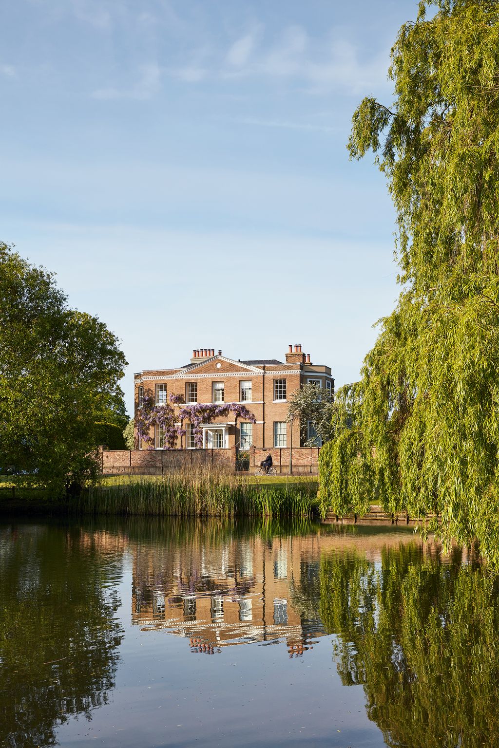 Image may contain Nature Outdoors Water Tree Plant Architecture Building Castle Land Fort Pond Housing and Moat