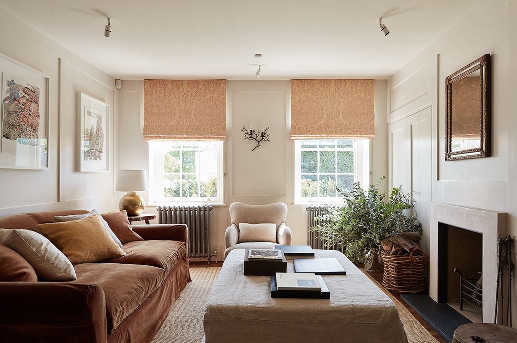 Image may contain Furniture Living Room Indoors Room Couch and Interior Design