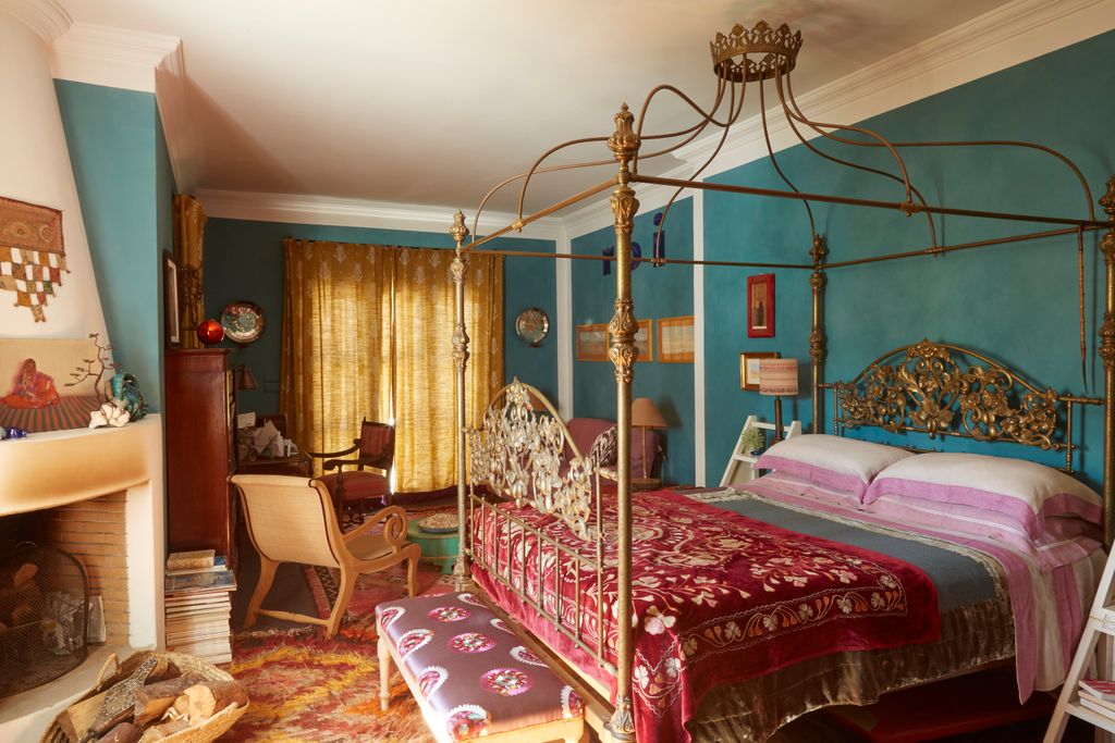 Image may contain Furniture Home Decor Indoors Room Bedroom Bed Interior Design Living Room Chair and Cushion