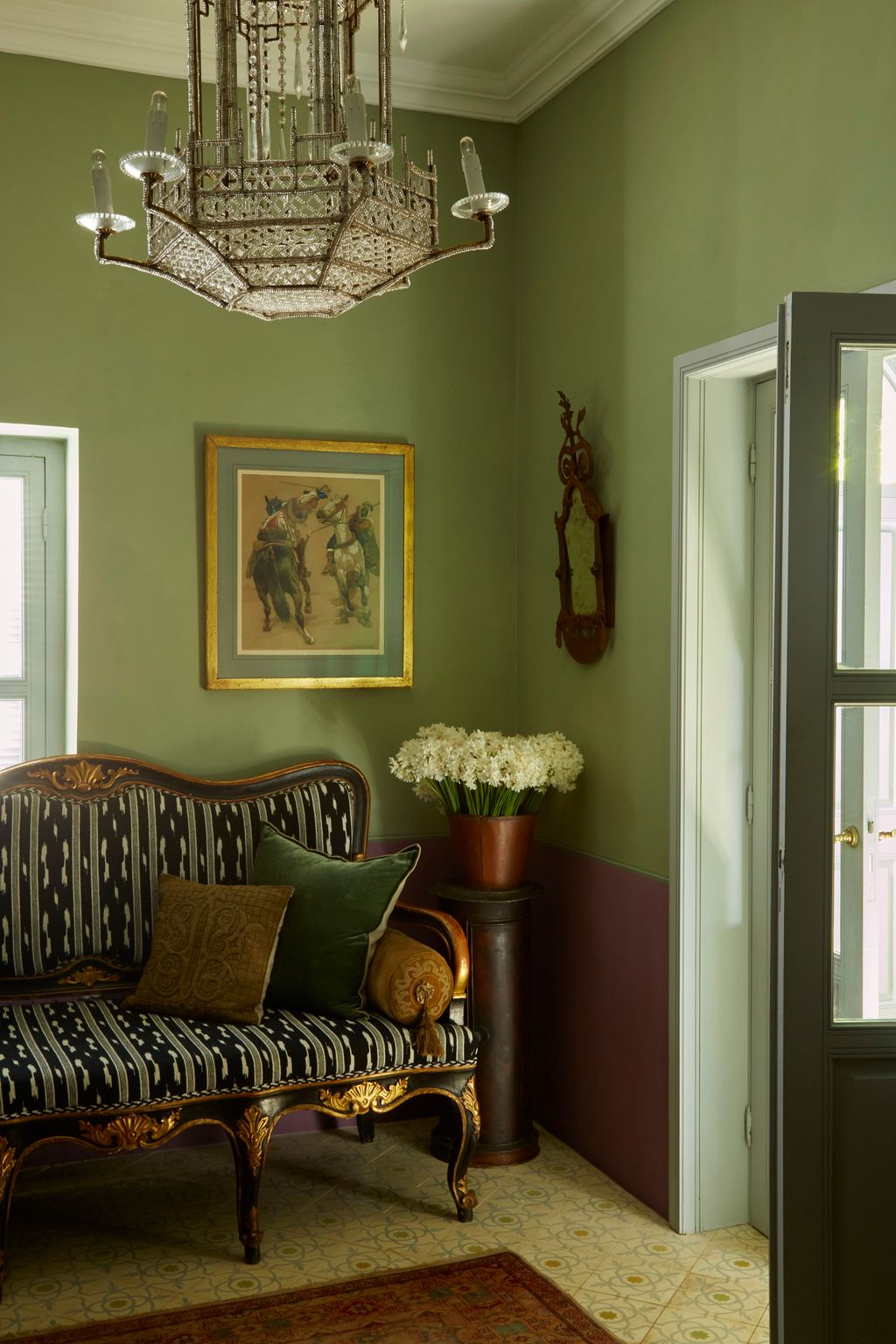 Image may contain Living Room Indoors Room Lamp Chandelier Furniture and Interior Design