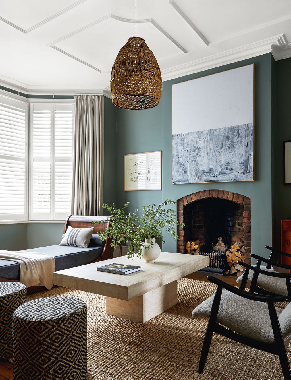 Image may contain Furniture Home Decor Table Living Room Room Indoors Chair Coffee Table and Interior Design