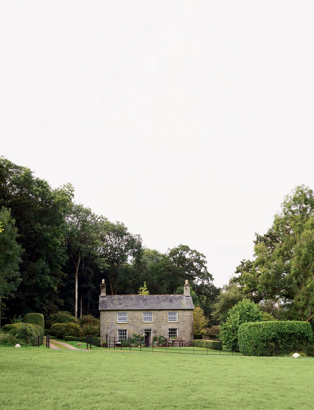 Image may contain Grass Plant Outdoors Cottage Housing House Building Nature Lawn and Tree