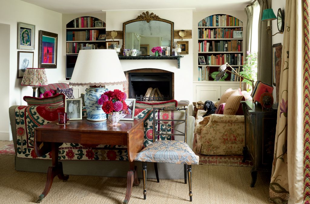 Floras grandmothers sofa  is covered with an antique Swedish throw.