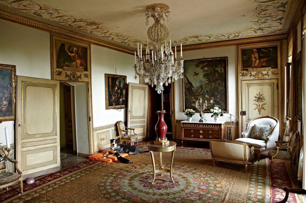 Image may contain Living Room Room Indoors Flooring Furniture Interior Design Floor Lamp Chandelier and Home Decor