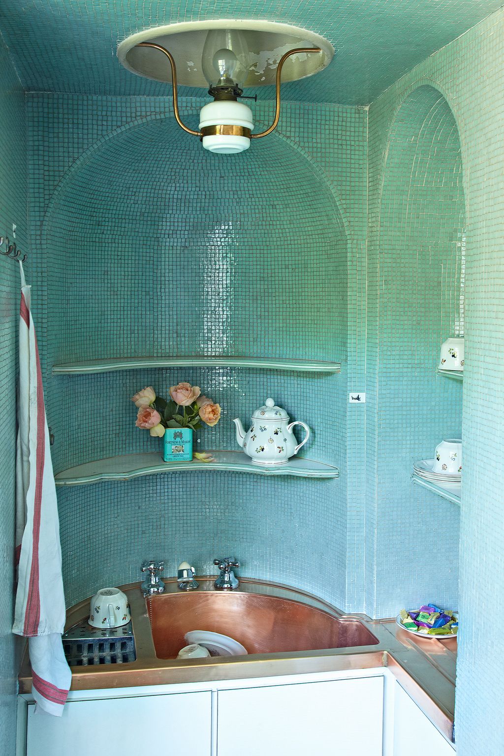 Image may contain Indoors Interior Design Room Ceiling Fan and Appliance