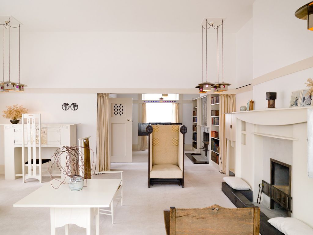 Image may contain Interior Design Indoors Furniture Wood Living Room Room Lighting Floor Flooring and Plywood