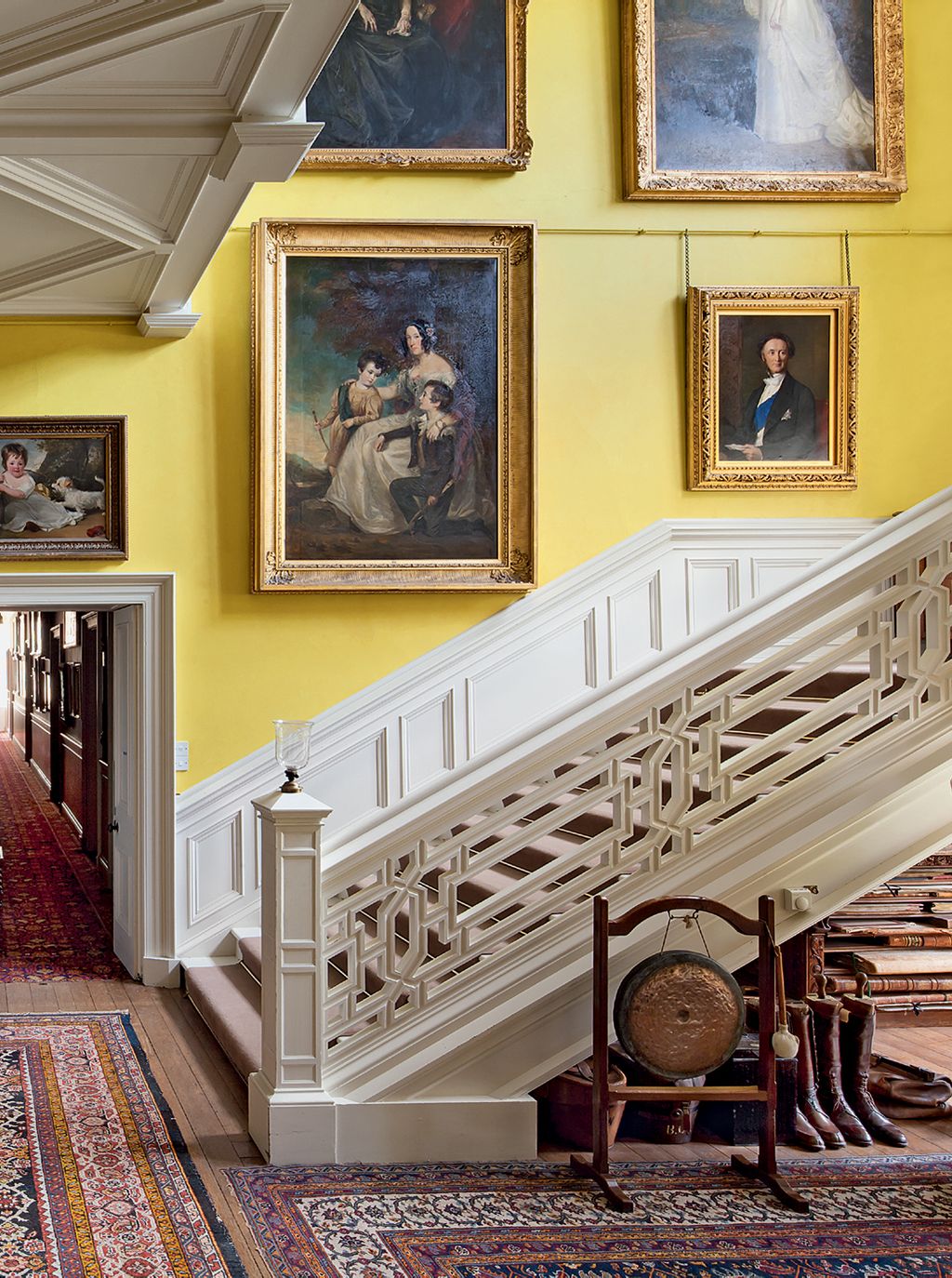 Image may contain Wood Banister Handrail Flooring Human Person Hardwood Interior Design Indoors and Floor