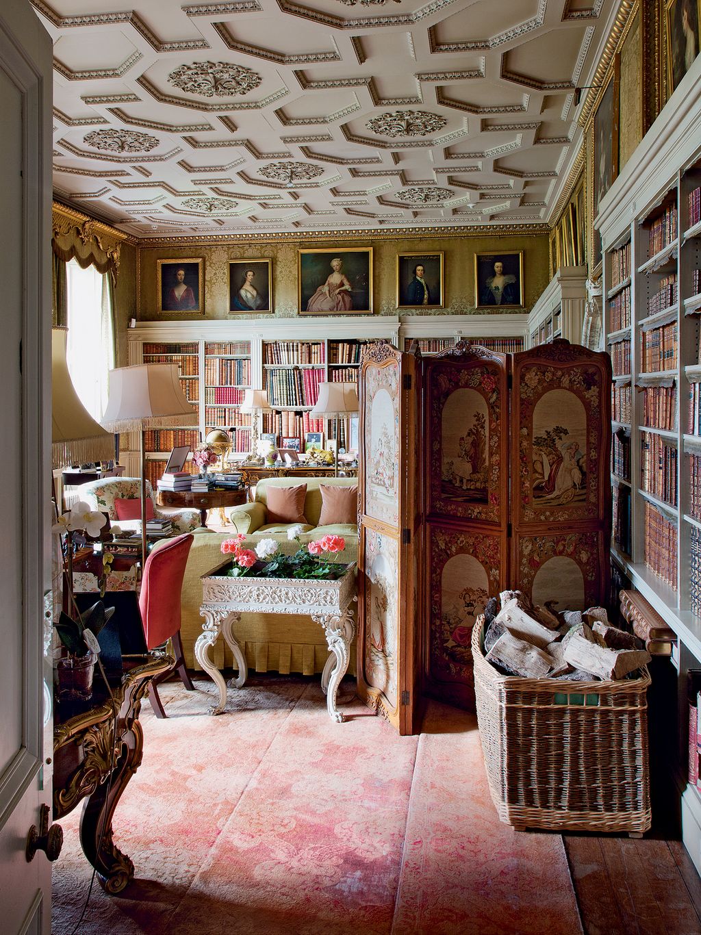 Image may contain Furniture Shelf Living Room Room Indoors Interior Design Flooring Human Person and Bookcase