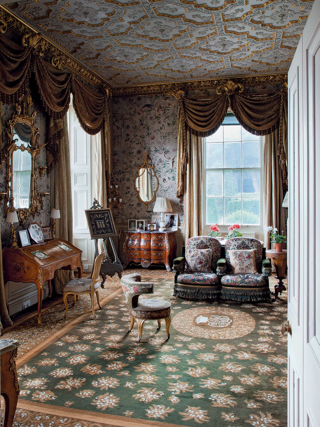 Image may contain Furniture Living Room Indoors Room Couch Rug Home Decor and Flooring