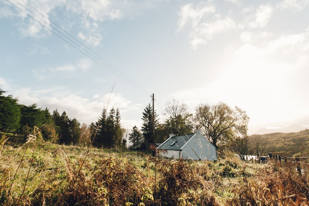 Image may contain Outdoors Nature Building Tent Tree Plant Countryside Fir Abies Rural Hut Housing and Shack