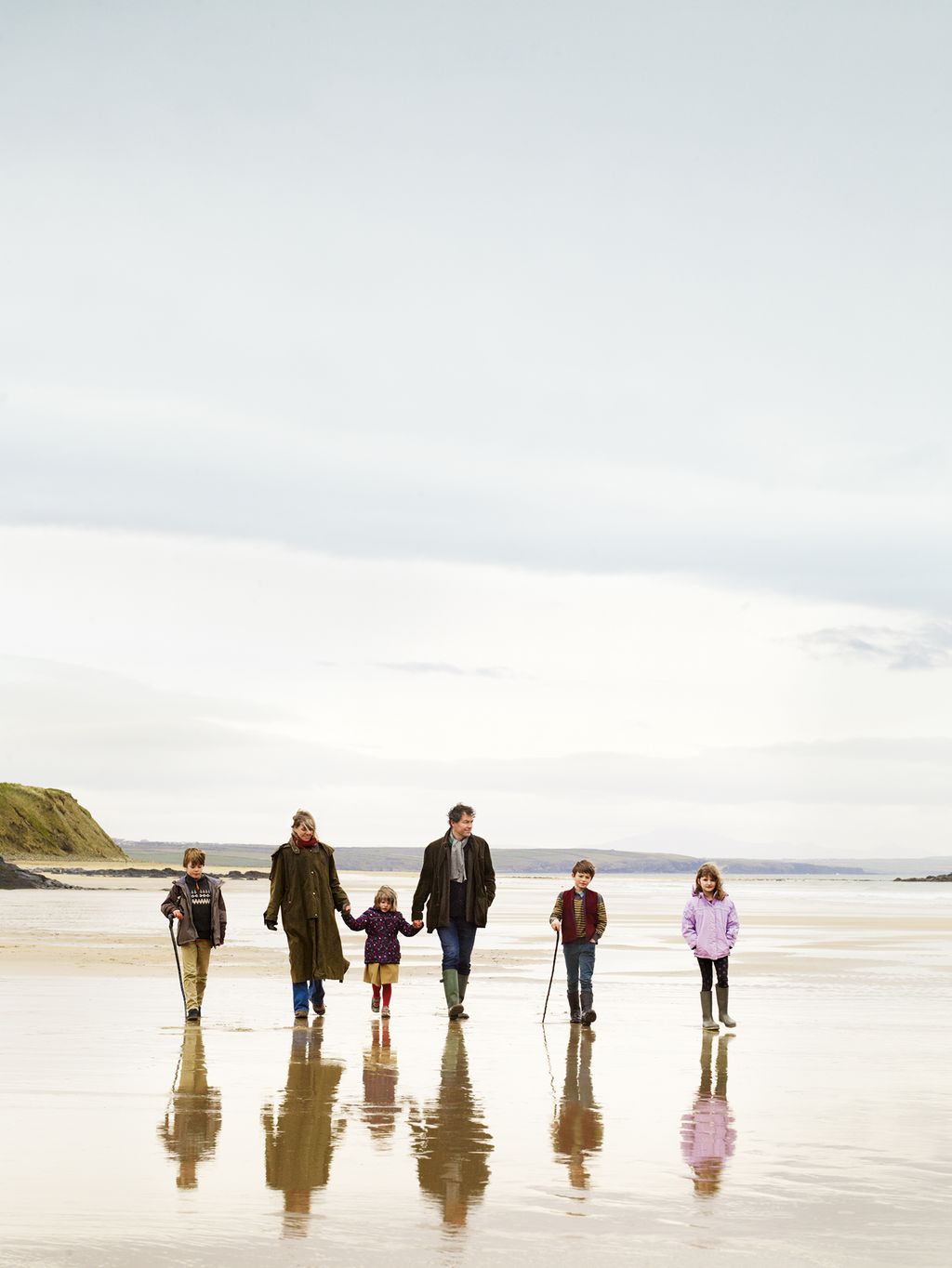 Image may contain Human Person Walking Standing People and Hand