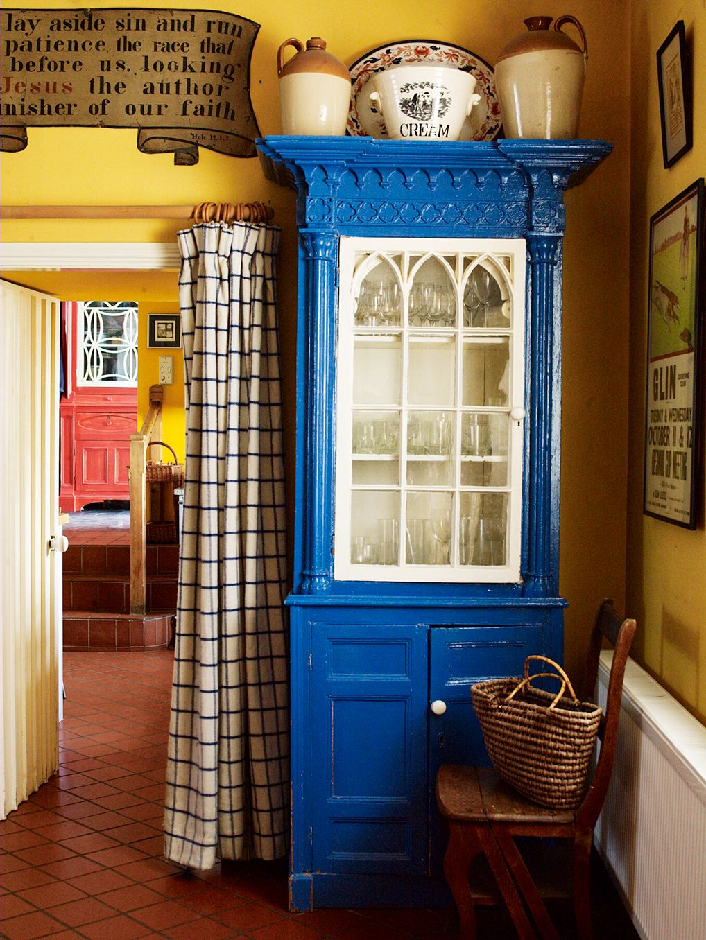 Image may contain Furniture Flooring Door Chair Floor Interior Design Indoors Shelf Wood Hardwood and Cupboard