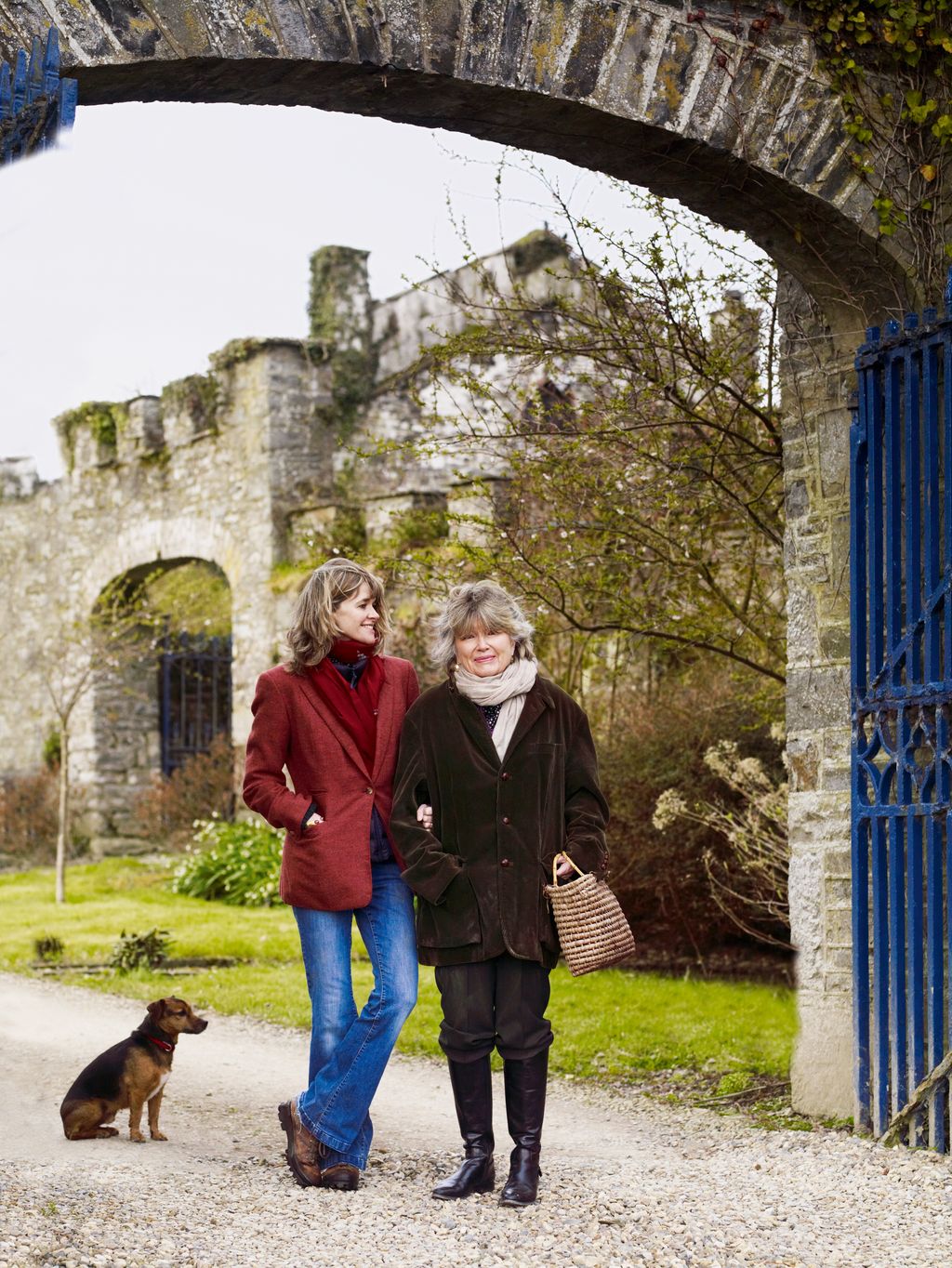 Image may contain Clothing Apparel Human Person Animal Dog Mammal Pet Canine Footwear Shoe Pants and Denim