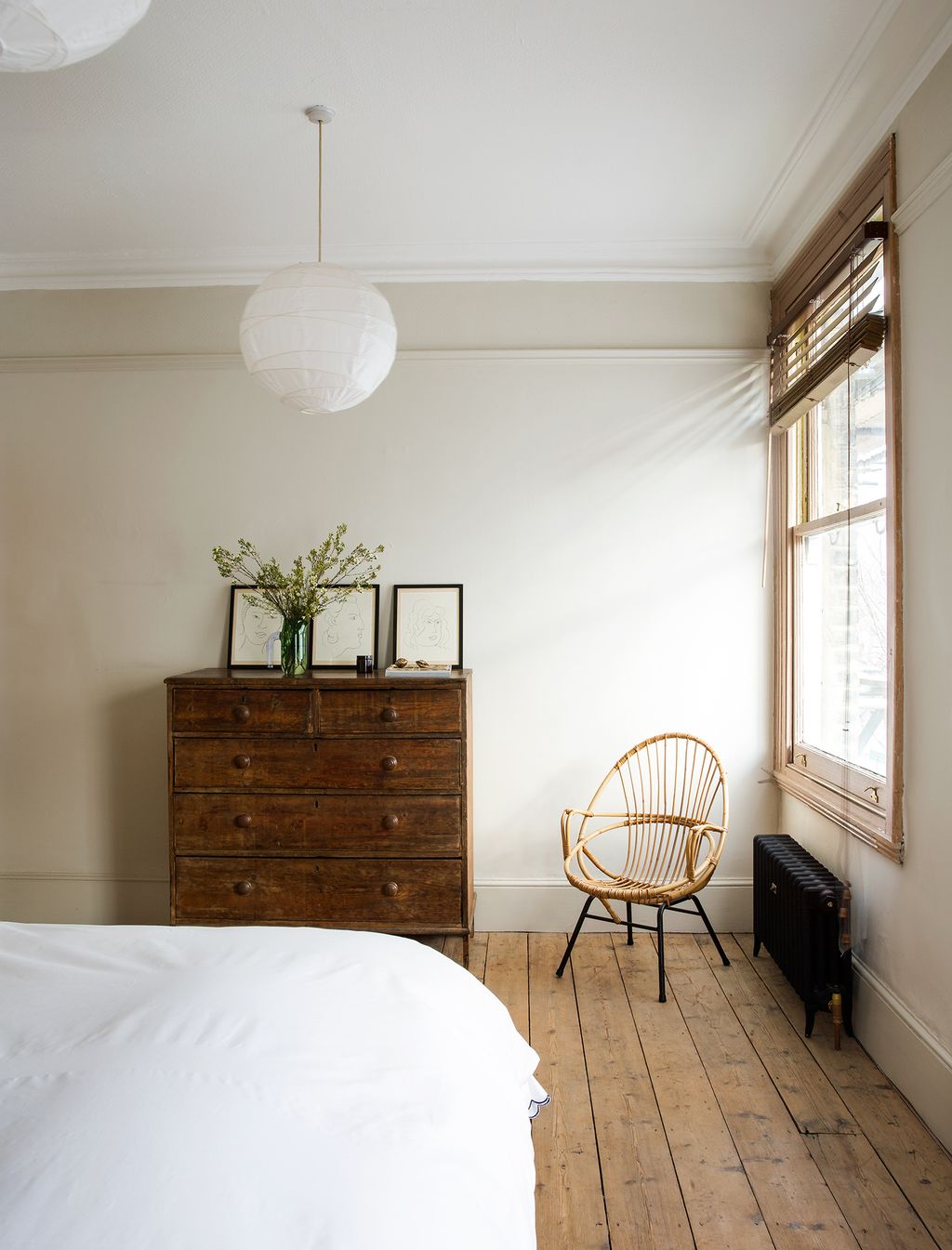 Image may contain Furniture Flooring Chair Interior Design Indoors Bed Hardwood Wood Cabinet Dresser and Floor