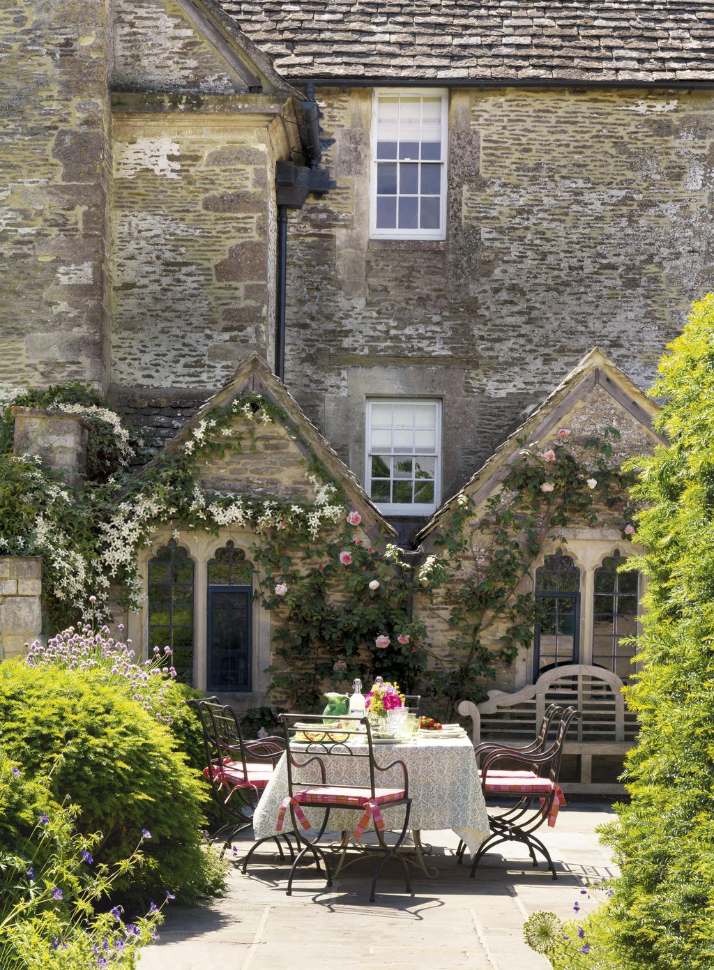 Image may contain Furniture Chair Cottage Housing House Building Patio Path and Walkway