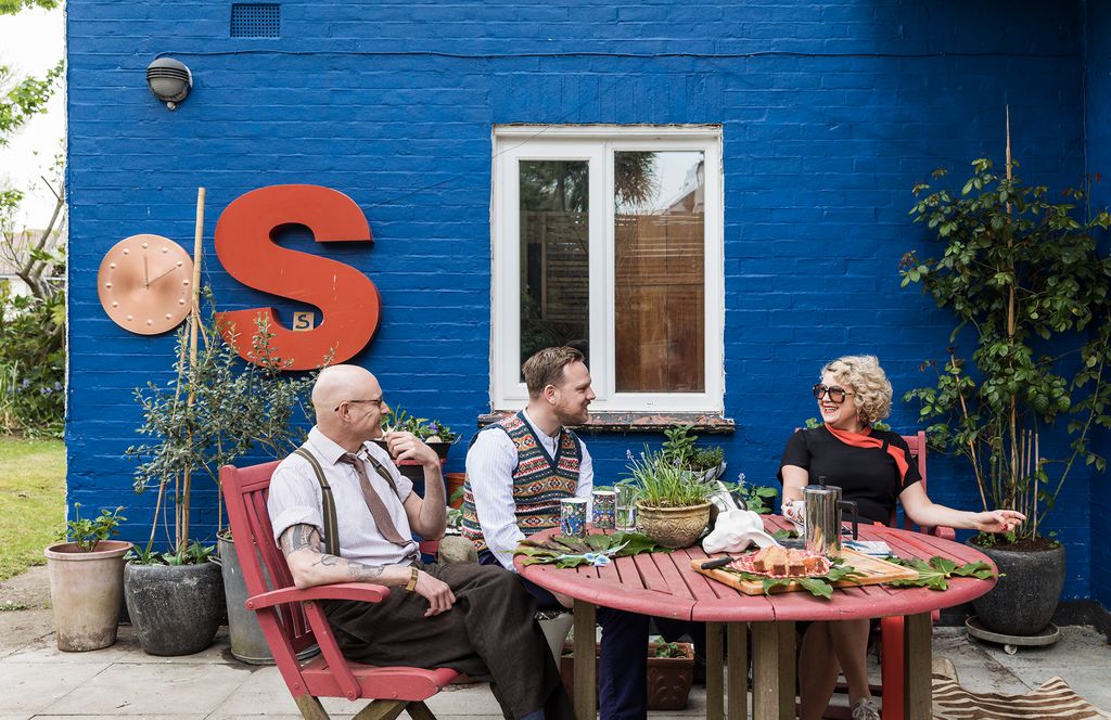 Image may contain Sitting Human Person Furniture Table Dining Table Food and Meal