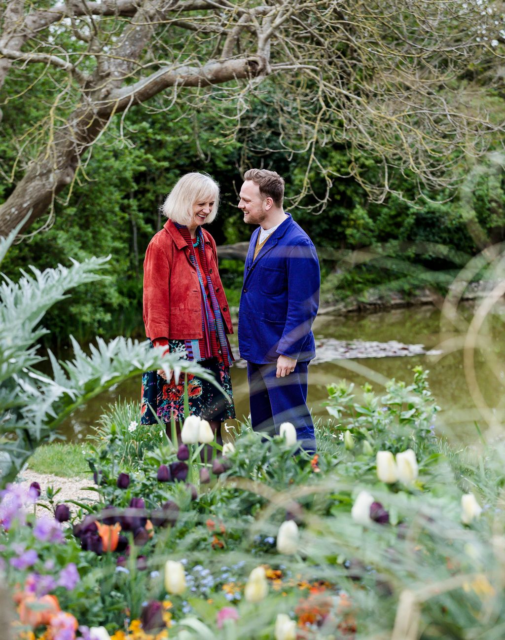 Image may contain Human Person Outdoors Clothing Apparel Plant Garden Tree and Nature