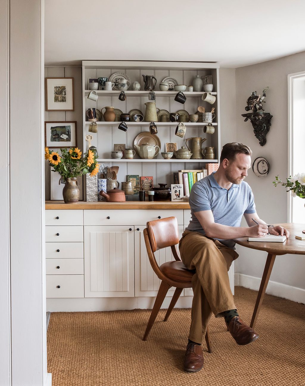 Simon at his Ercol kitchen table.