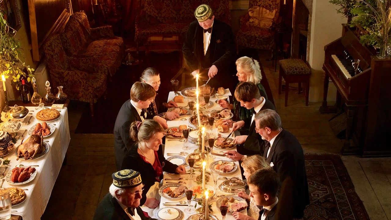 Image may contain Human Person Food Meal Restaurant Room Indoors Furniture Table Dining Table and People