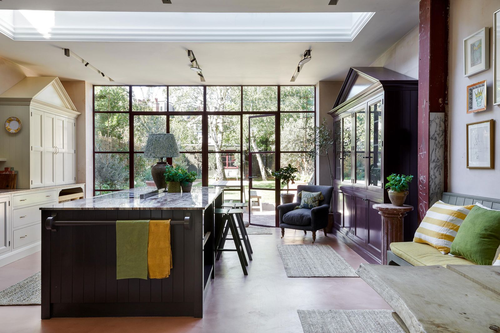 Two classically inspired dressers mirror each other across the room in Sarah CorbettWinder's London house
