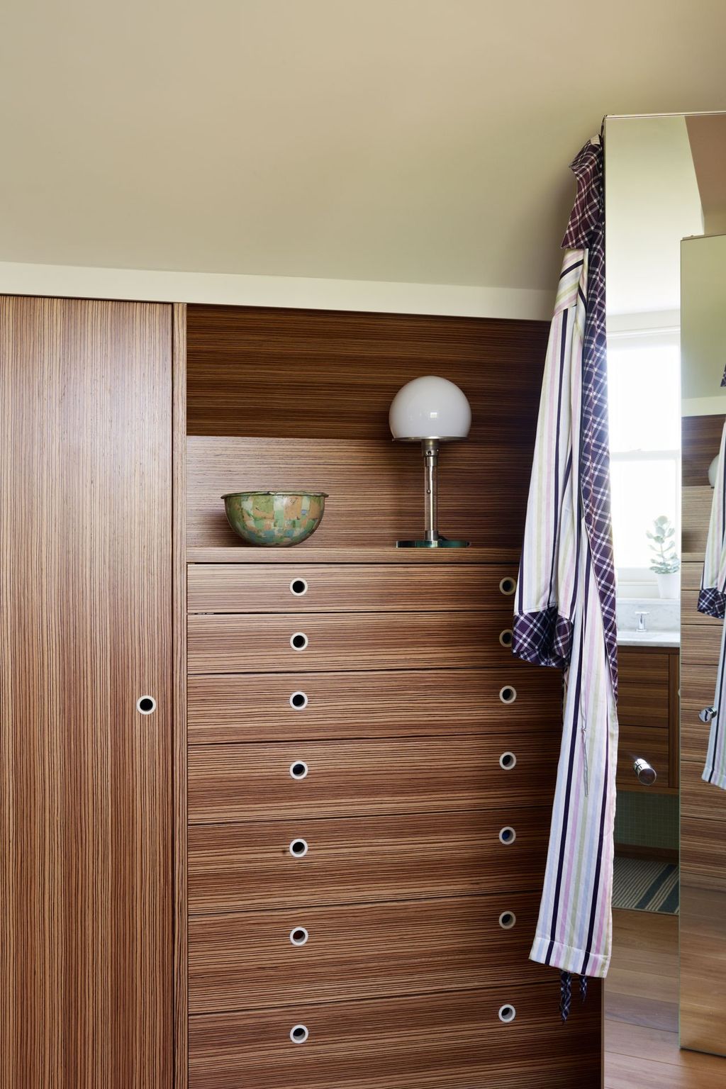 Image may contain Furniture Wood Cupboard Closet Indoors Sideboard and Hardwood