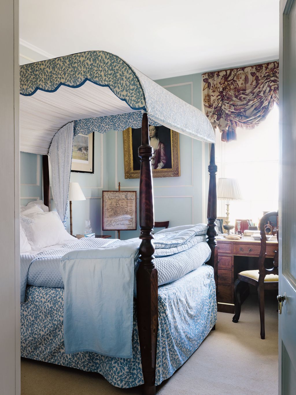 The nineteenthcentury American bed was found in an antiques shop in Henley in the Seventies.