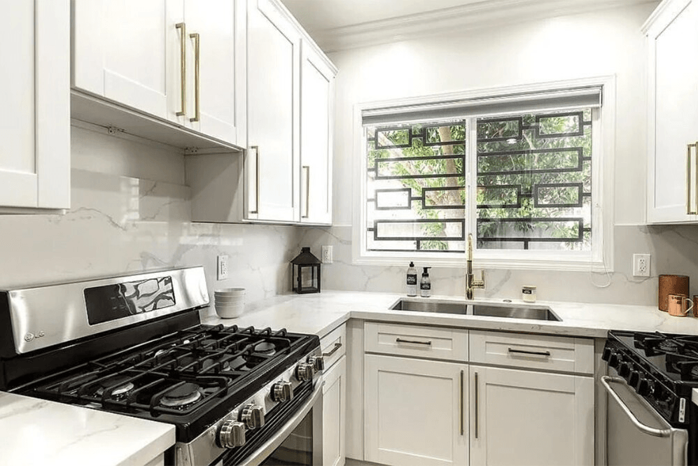 Image may contain Indoors Room Kitchen Interior Design and Cooktop
