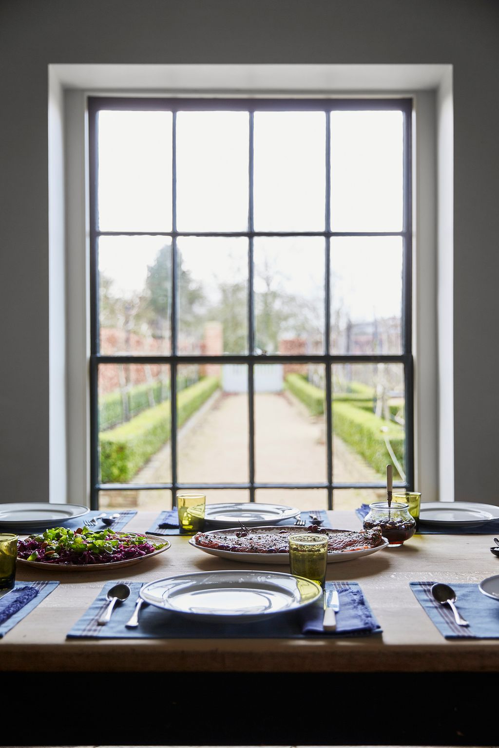 Image may contain Food Meal Dish Furniture Table Dining Table and Window