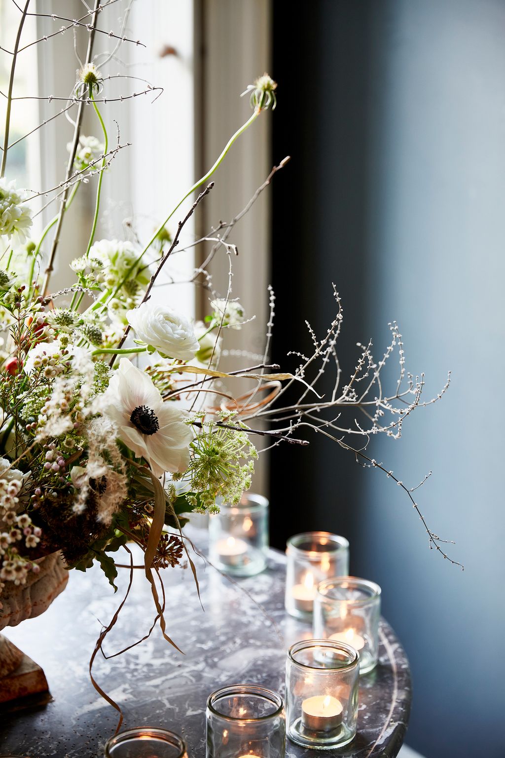 Image may contain Flower Ikebana Ornament Vase Flower Arrangement Plant Art Pottery Jar and Blossom