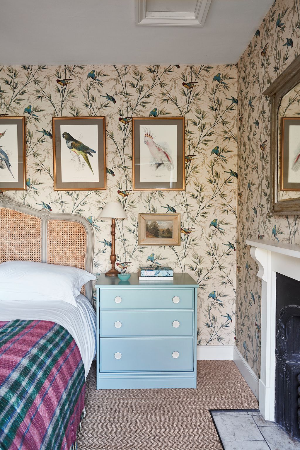 Image may contain Furniture Indoors Room Bedroom Bed Interior Design Animal and Bird